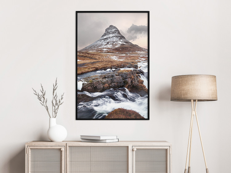 Wall Poster Kirkjufell - winter landscape of a mountain and a stream against the sky 130383 additionalImage 4