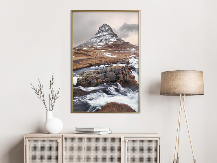 Wall Poster Kirkjufell - winter landscape of a mountain and a stream against the sky 130383 additionalImage 5