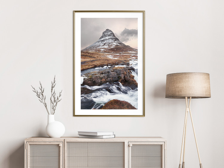 Wall Poster Kirkjufell - winter landscape of a mountain and a stream against the sky 130383 additionalImage 15