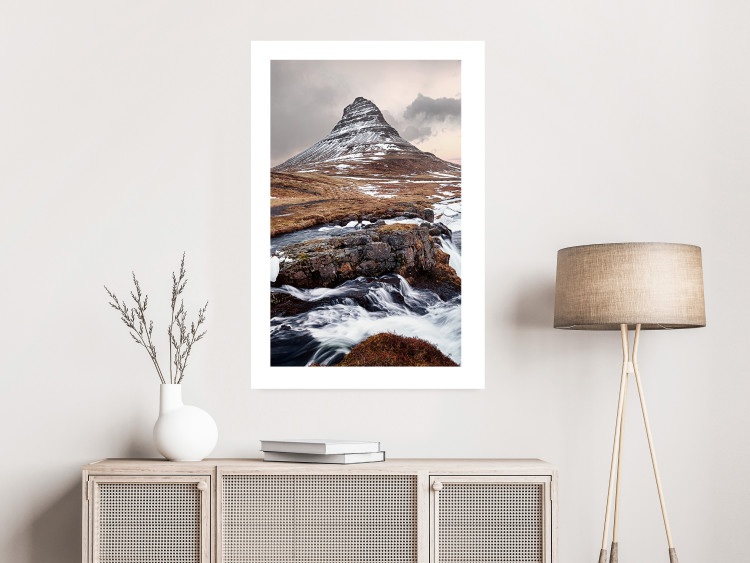 Wall Poster Kirkjufell - winter landscape of a mountain and a stream against the sky 130383 additionalImage 3