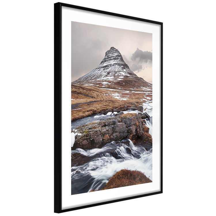 Wall Poster Kirkjufell - winter landscape of a mountain and a stream against the sky 130383 additionalImage 8