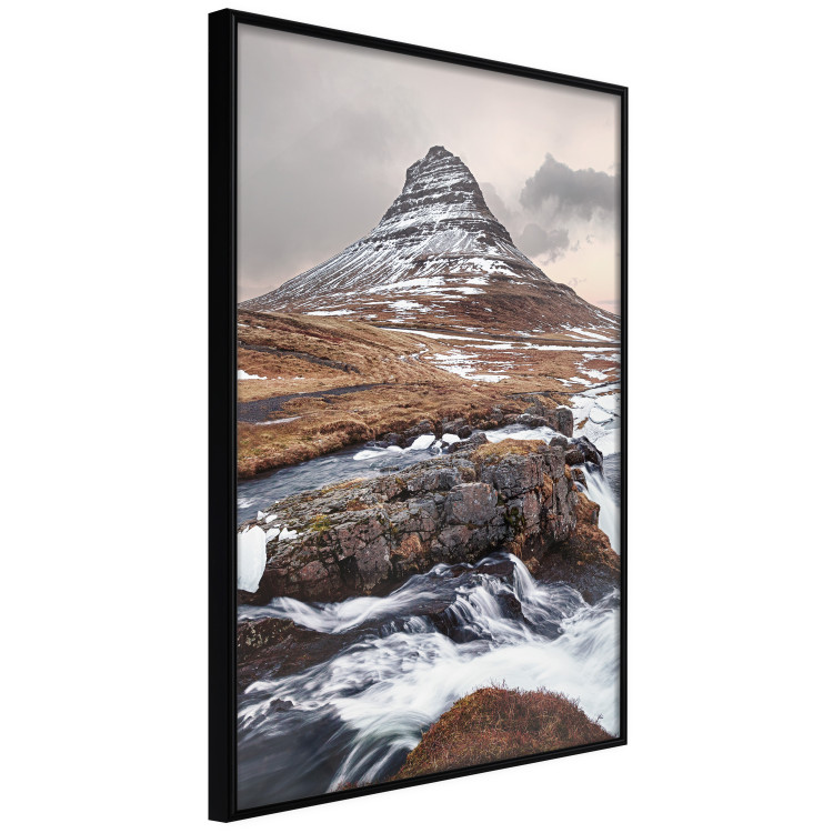 Wall Poster Kirkjufell - winter landscape of a mountain and a stream against the sky 130383 additionalImage 11