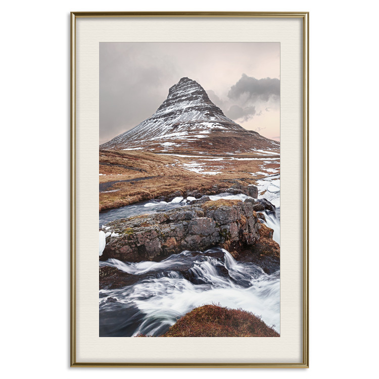 Wall Poster Kirkjufell - winter landscape of a mountain and a stream against the sky 130383 additionalImage 21
