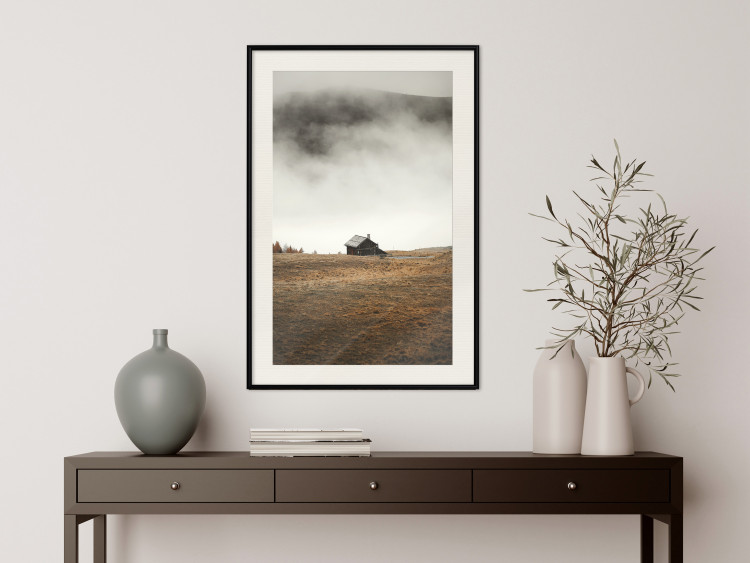 Poster Mountain Retreat - field landscape with a small cottage against white clouds 131783 additionalImage 24
