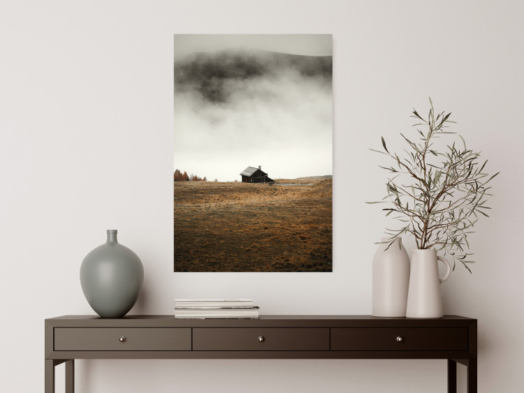 Poster Mountain Retreat - field landscape with a small cottage against white clouds 131783 additionalImage 4