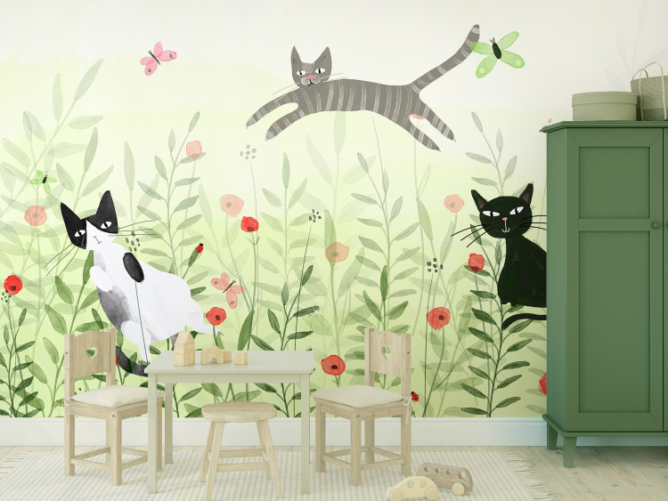 Wall Mural Cat mischief - cats in a meadow with butterflies among grass and poppies for a room 142683