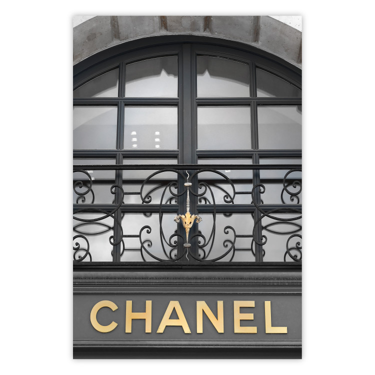 Poster Golden Signboard - golden inscription on black architectural building with window 128014