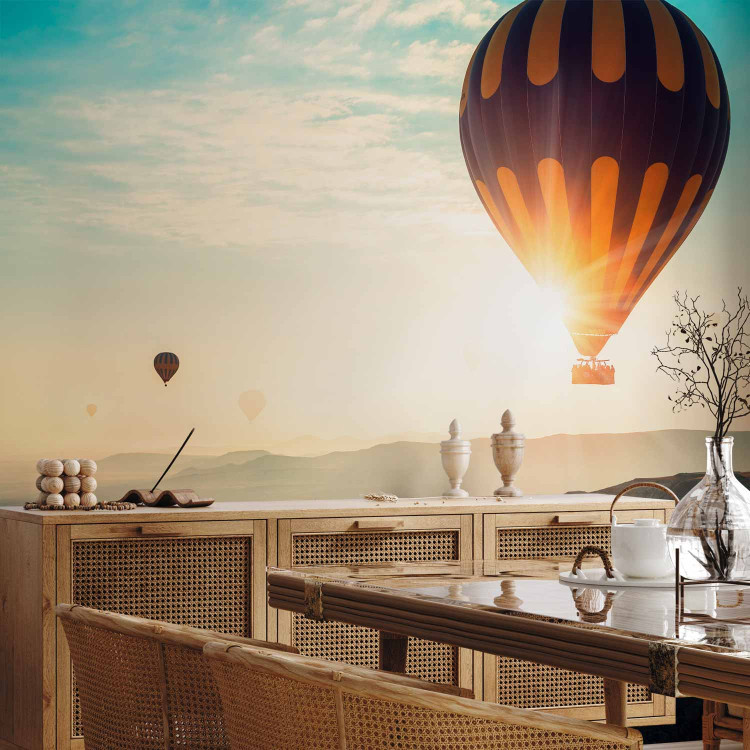 Wall Mural Balloon flight - landscape of balloons soaring into the sky over mountains 143124 additionalImage 7