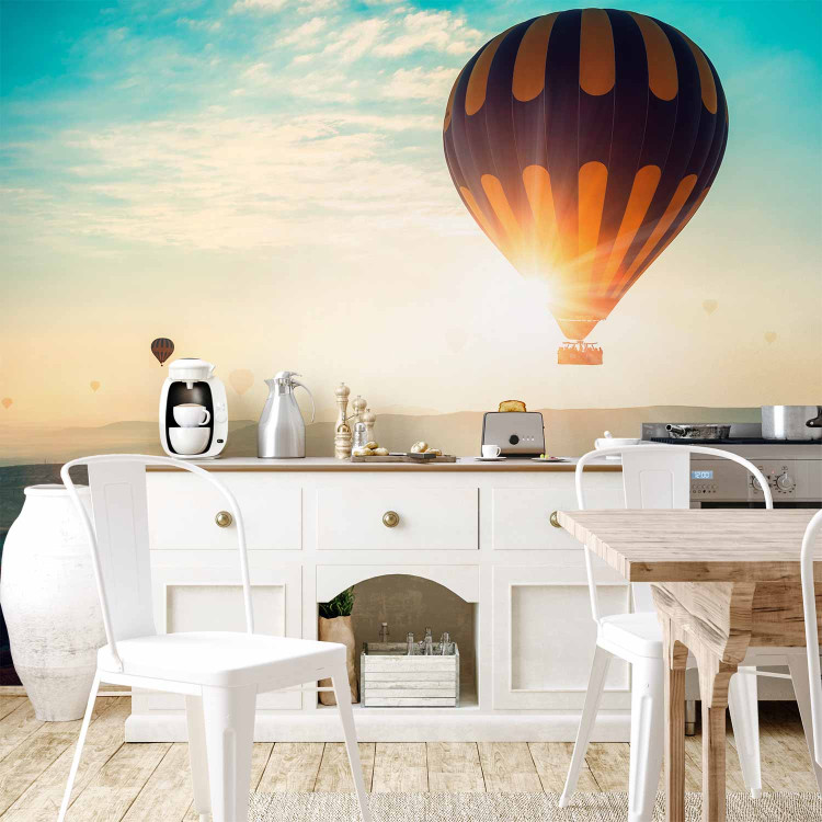 Wall Mural Balloon flight - landscape of balloons soaring into the sky over mountains 143124 additionalImage 6