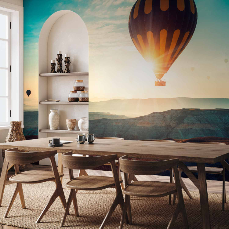 Wall Mural Balloon flight - landscape of balloons soaring into the sky over mountains 143124 additionalImage 4