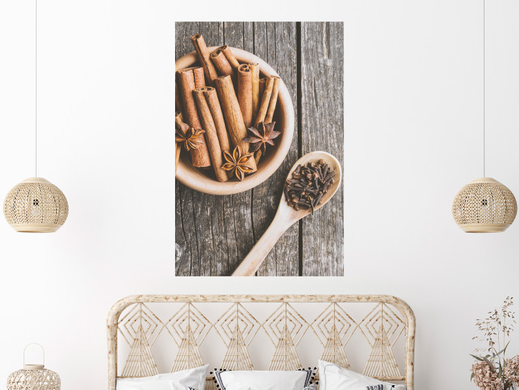 Wall Poster Spice Scent - winter cinnamon spice lying on a wooden table 124454 additionalImage 23