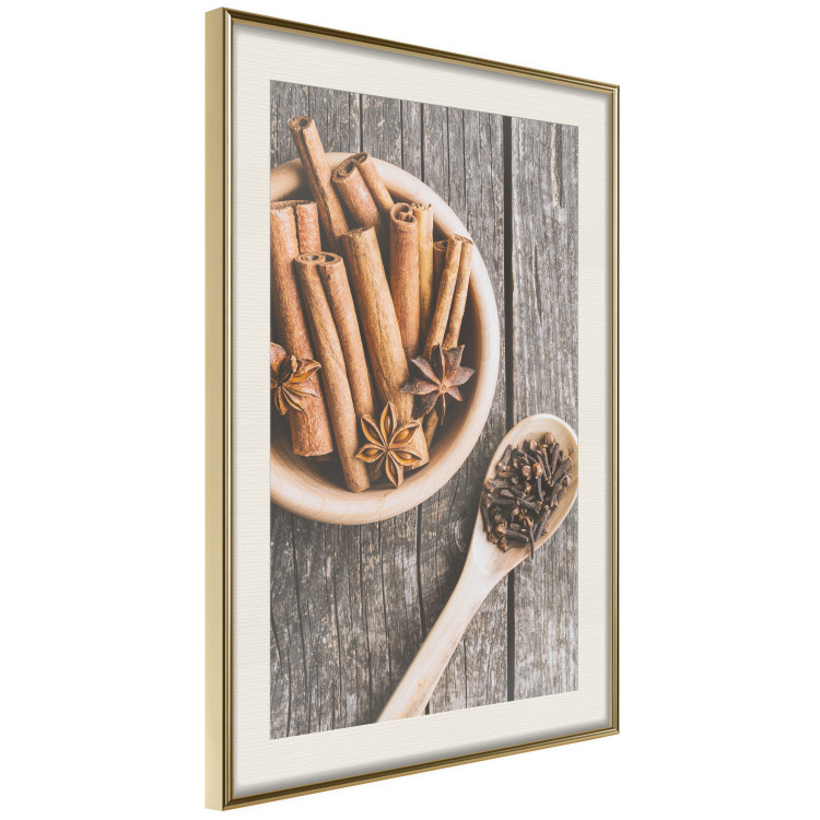 Wall Poster Spice Scent - winter cinnamon spice lying on a wooden table 124454 additionalImage 2