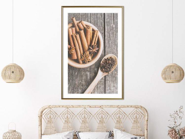 Wall Poster Spice Scent - winter cinnamon spice lying on a wooden table 124454 additionalImage 13