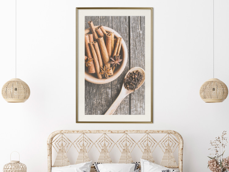 Wall Poster Spice Scent - winter cinnamon spice lying on a wooden table 124454 additionalImage 21