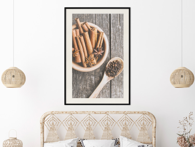 Wall Poster Spice Scent - winter cinnamon spice lying on a wooden table 124454 additionalImage 22