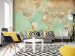 Wall Mural Turquoise world map - continents in shades of beige on a background in green 94554