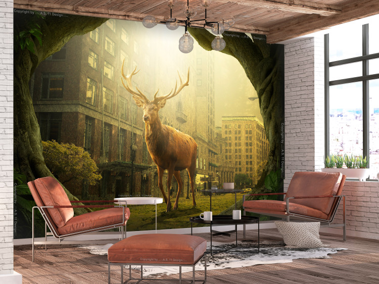 Wall Mural A deer walking through the city - an animal on the background of urban architecture 128764