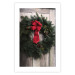 Poster Christmas Wreath - round spruce decoration hung on the door 137974 additionalThumb 10