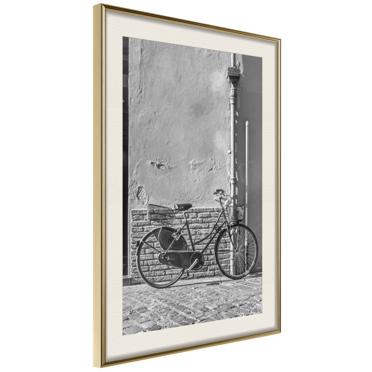Wall Poster Old Italian Bicycle - black and white shot with a view of a stone street 117784 additionalImage 2