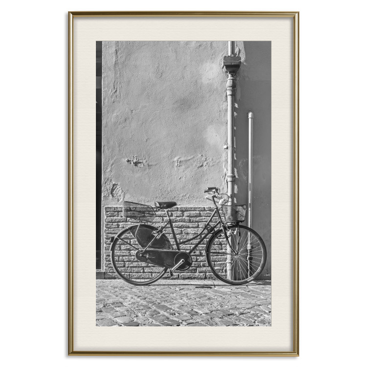 Wall Poster Old Italian Bicycle - black and white shot with a view of a stone street 117784 additionalImage 19