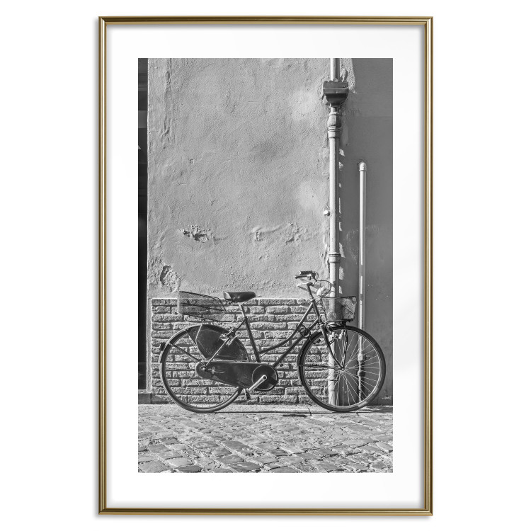 Wall Poster Old Italian Bicycle - black and white shot with a view of a stone street 117784 additionalImage 16