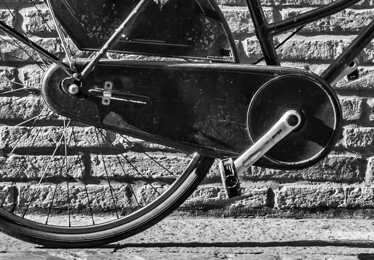 Wall Poster Old Italian Bicycle - black and white shot with a view of a stone street 117784 additionalImage 10