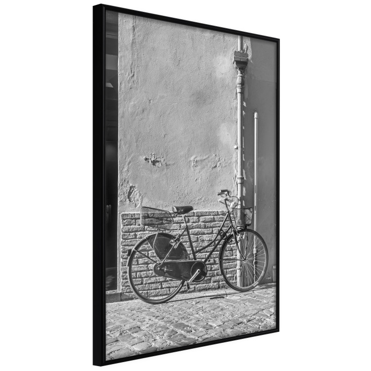 Wall Poster Old Italian Bicycle - black and white shot with a view of a stone street 117784 additionalImage 10