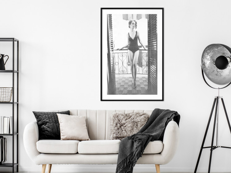 Wall Poster Petite Woman - black and white photograph of a slender woman on a balcony 134184 additionalImage 18