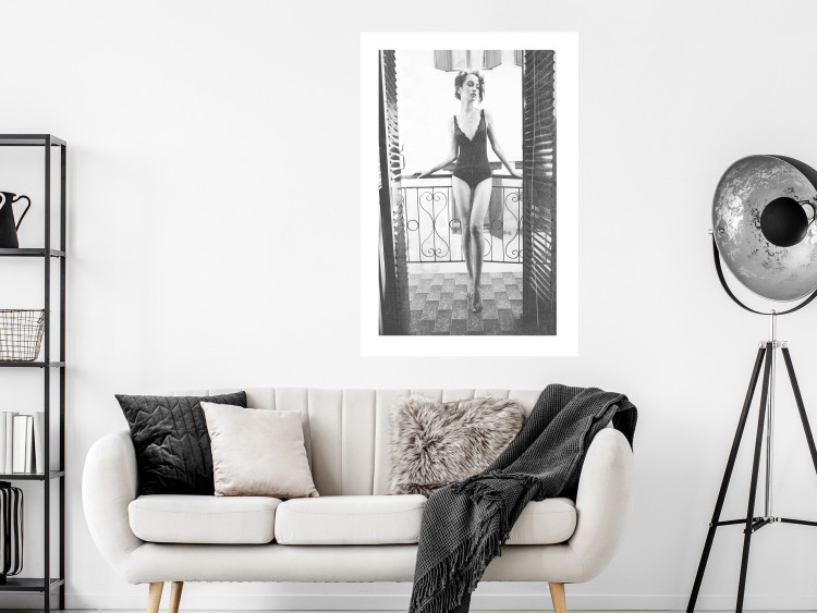 Wall Poster Petite Woman - black and white photograph of a slender woman on a balcony 134184 additionalImage 3