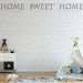 Photo Wallpaper Home Sweet Home - Beige Text with Shadow and Reflection on White Brick 60884 additionalThumb 6