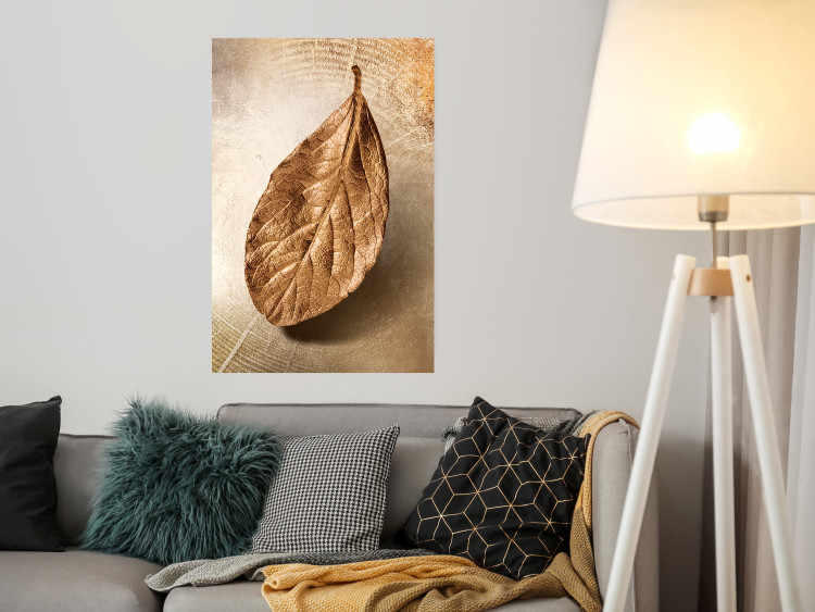 Poster Golden Lightness - golden leaf with distinct texture on a beige background 127394 additionalImage 4