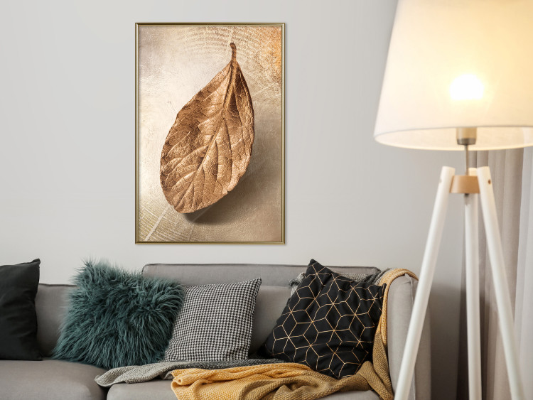 Poster Golden Lightness - golden leaf with distinct texture on a beige background 127394 additionalImage 7