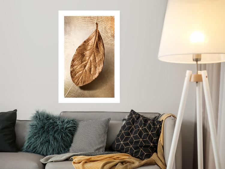 Poster Golden Lightness - golden leaf with distinct texture on a beige background 127394 additionalImage 5