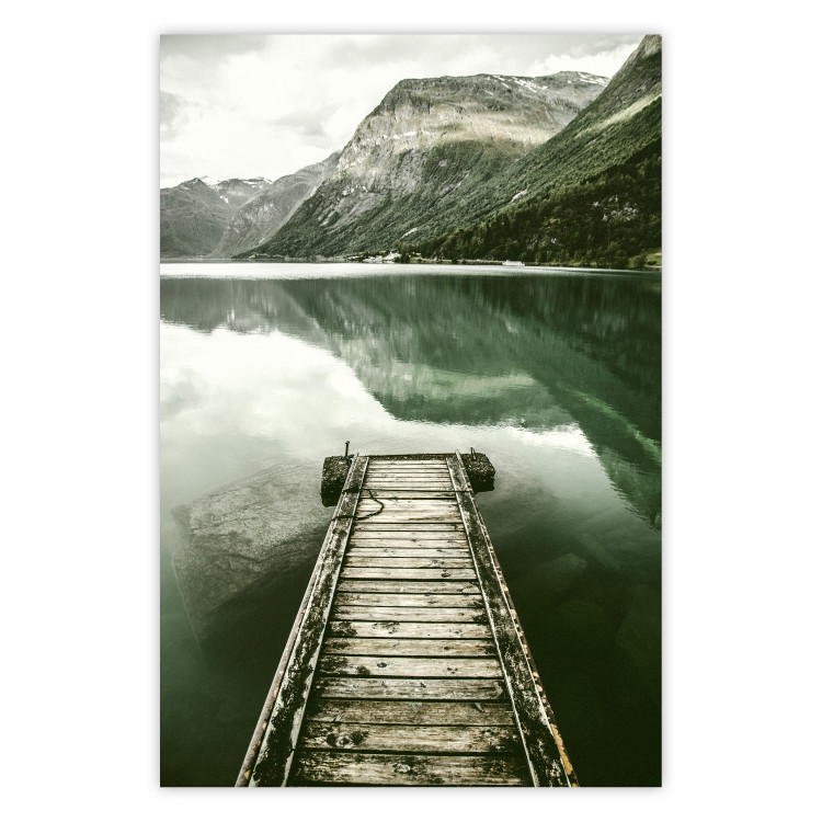 Poster Silence - landscape of a lake with a wooden pier against mountains and sky 130294