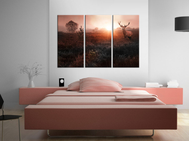 Canvas Art Print Deer in Sunlight (3-piece) - Red Landscape with Trees in Background 106105 additionalImage 3