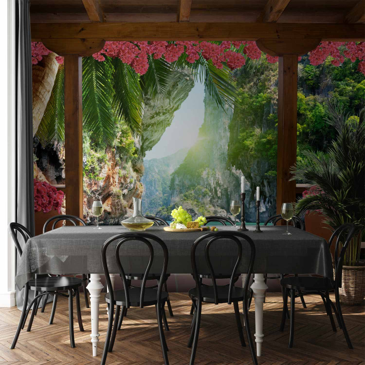 Wall Mural Tropical view - landscape with turquoise water surrounded by palm trees and flowers 129105 additionalImage 6