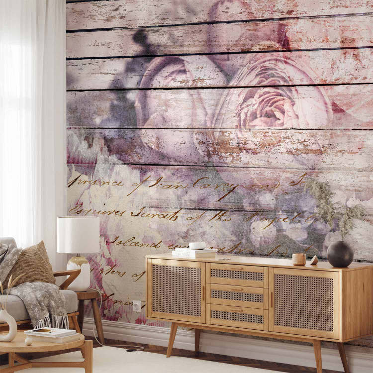Wall Mural Idyll - flowers in purple with lettering on a wood-textured background 144505