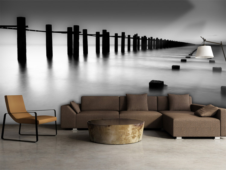 Wall Mural Melancholia - Black and white landscape of the mouth of the River Thames with a breakwater 61705