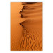 Wall Poster Sandy Shapes - orange-brown desert landscape in Morocco 116515