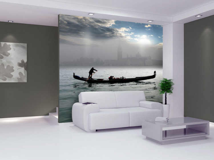 Wall Mural Urban architecture of Venice - gondola cruise on the sea with the city in the background 97215