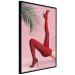 Poster Red Tights - Woman Legs, High Heels and Palm Leaf on a Pink Background 144125 additionalThumb 2