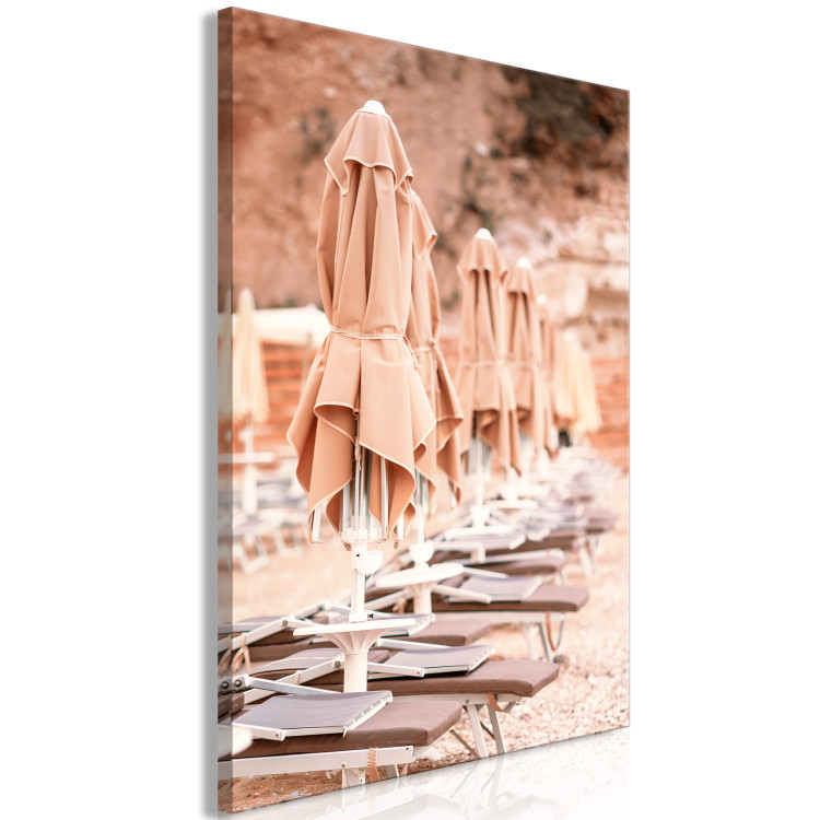 Canvas Art Print Seaside resort - Italian landscape with a stone beach and parasols 135835 additionalImage 2