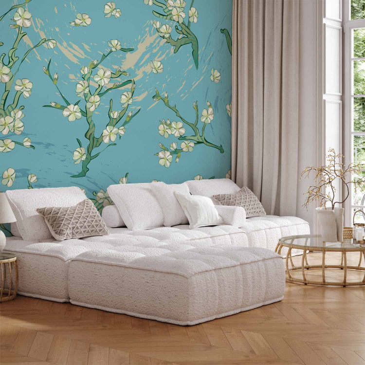 Wall Mural Flowers of Asia - blooming almond tree flowers on a blue background 142435
