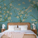 Wall Mural Flowers of Asia - blooming almond tree flowers on a blue background 142435 additionalThumb 2