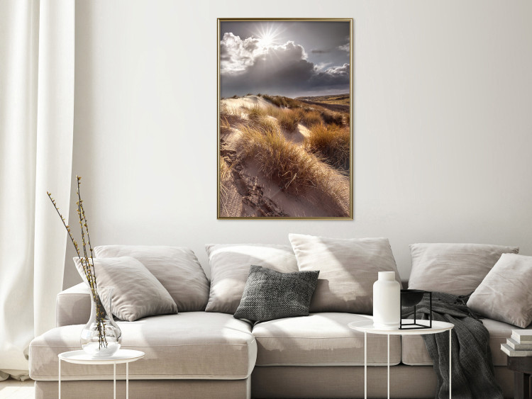 Poster Trembling Whispers - sunlit meadow landscape against dense clouds 138045 additionalImage 16