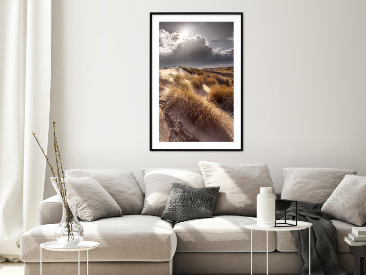 Poster Trembling Whispers - sunlit meadow landscape against dense clouds 138045 additionalImage 20