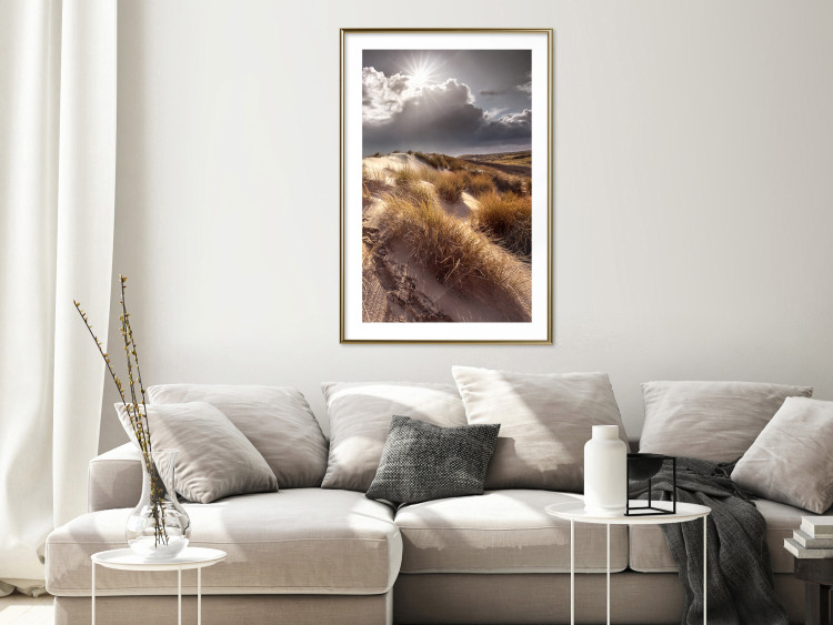 Poster Trembling Whispers - sunlit meadow landscape against dense clouds 138045 additionalImage 19