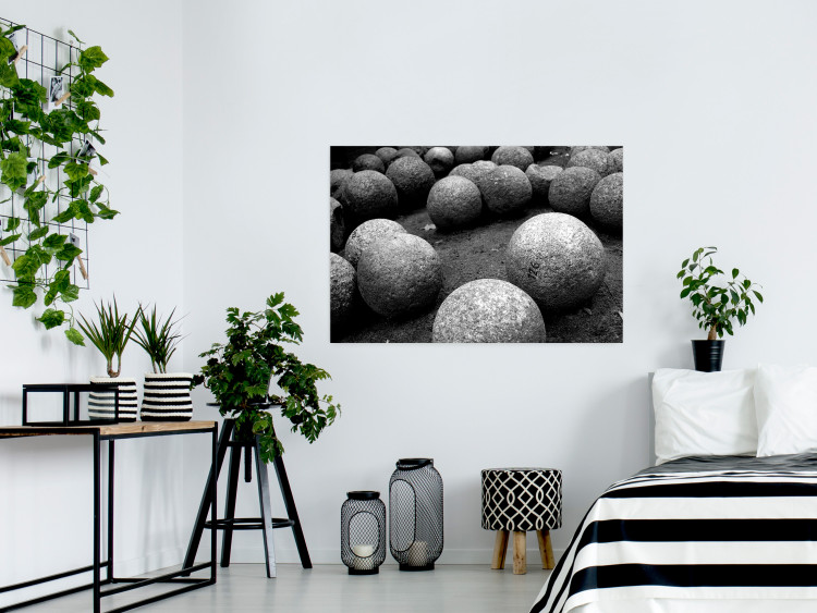 Wall Poster Stone balls - black and white composition with stones on dark soil 115055 additionalImage 17