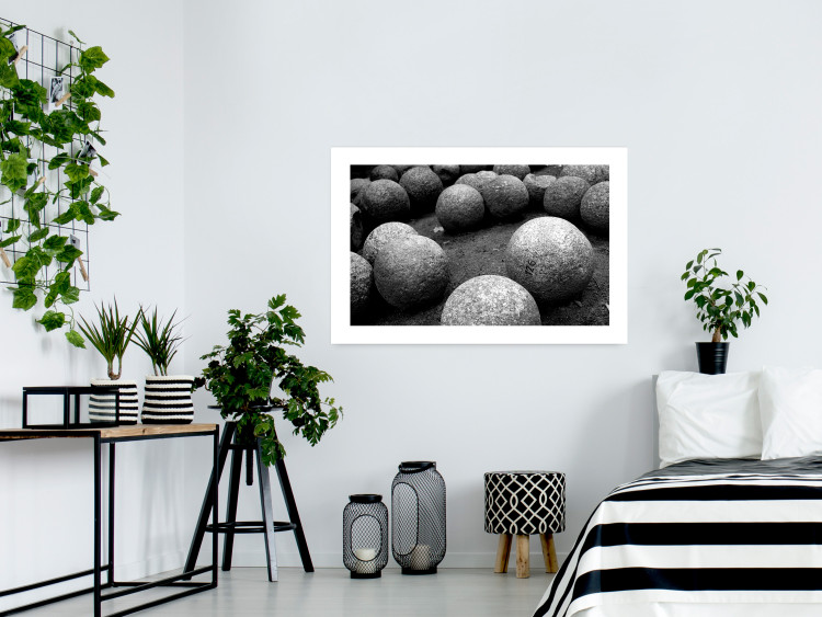 Wall Poster Stone balls - black and white composition with stones on dark soil 115055 additionalImage 11