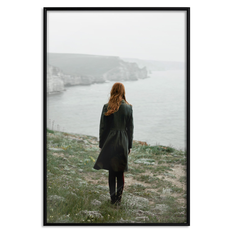 Wall Poster What Now? - landscape of a woman dressed in green against the sea and rocks 130295 additionalImage 27